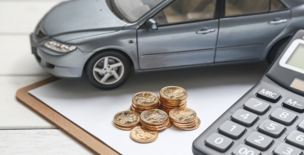 A car and keys symbolizing personal auto insurance coverage.